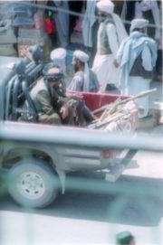 Armed Taliban in jeep in Herat, as pictured in July 2001
